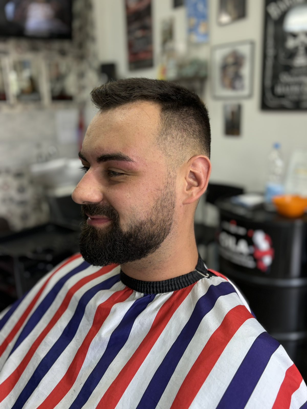 Fade haircut with beard trim